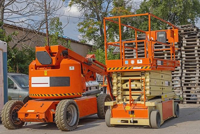 forklift lifting materials in a shipping warehouse in Avon